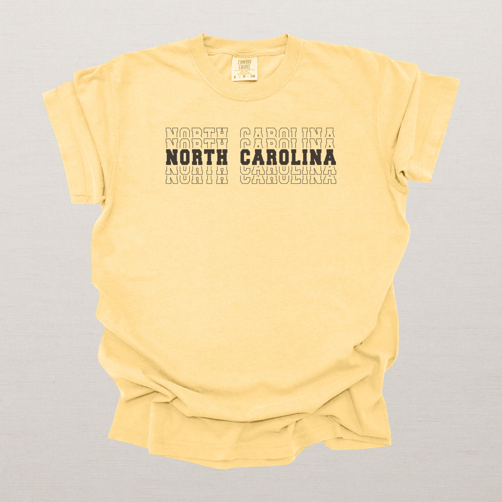 North Carolina Varsity Echo State Shirt | Comfort Colors Black Text