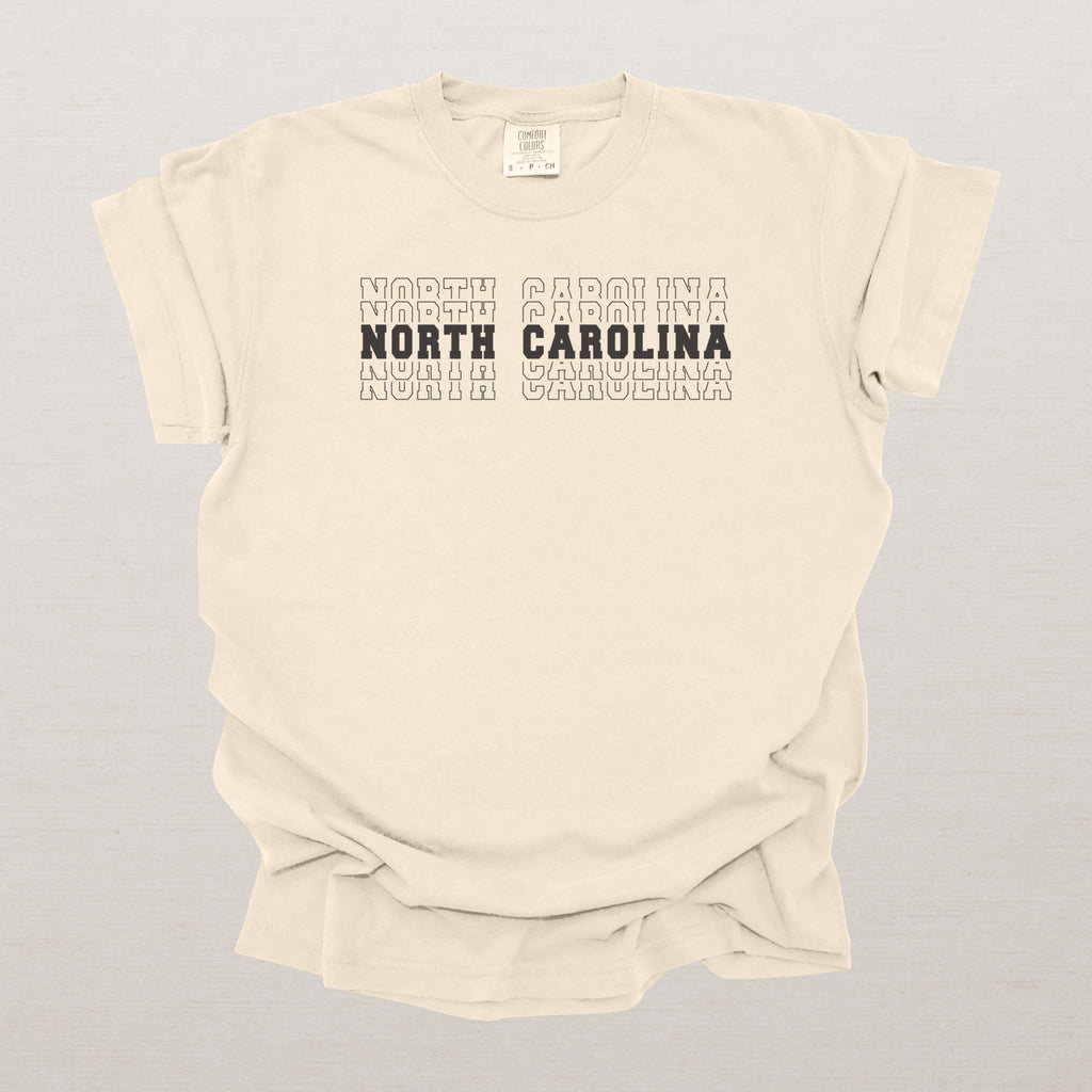 North Carolina Varsity Echo State Shirt | Comfort Colors Black Text