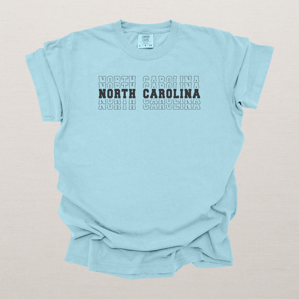 North Carolina Varsity Echo State Shirt | Comfort Colors Black Text