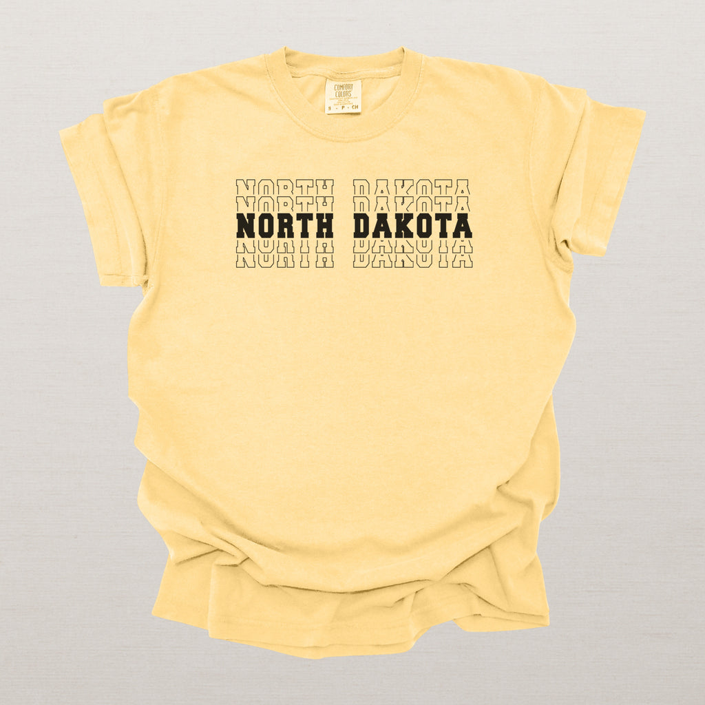 North Dakota Varsity Echo State Shirt | Comfort Colors Black Text